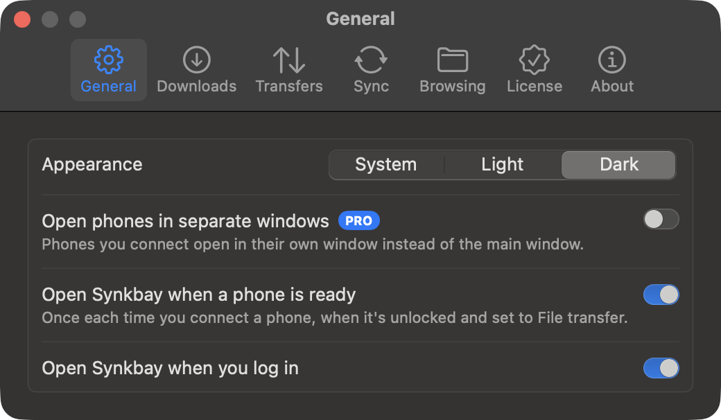 Settings, General tab: Appearance (System, Light or Dark), Open phones in separate windows, Open Synkbay when a phone is ready, and Open Synkbay when you log in, in dark mode
