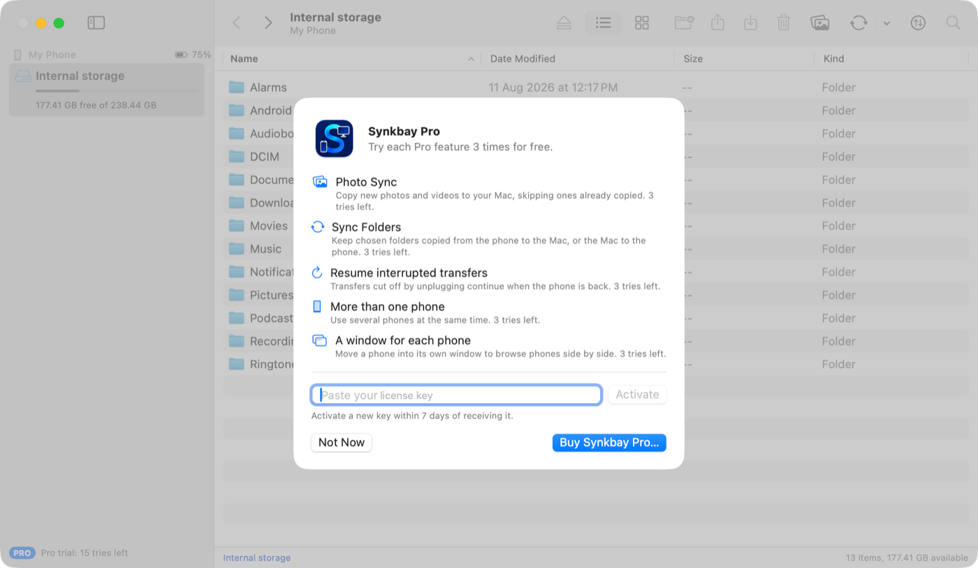 The Synkbay Pro sheet listing Photo Sync, Sync Folders, Resume interrupted transfers, More than one phone and A window for each phone, and the tries left for each, with a license key field and Buy Synkbay Pro